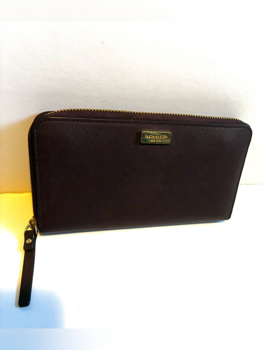 kate spade maroon zip-around wallet with gold hardware
